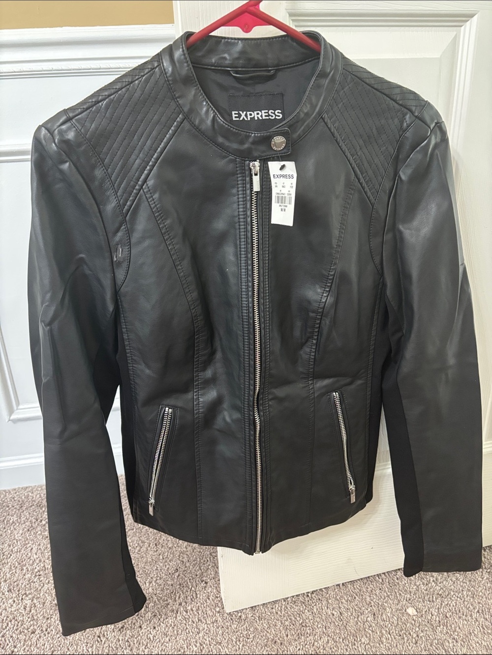 Express Women's Black Faux Leather Jacket with Quilted Shoulders
